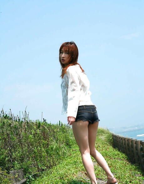 Sultry japanese cutie Nene in lingerie exhibits her ass on the beach